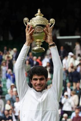 16th July 2023; All England Lawn Tennis and Croquet Club, London, England: Wimbledon Tennis Tournament; Mens singles final on centre court Novak Djokovic versus Carlos Alcaraz; Carlos Alcaraz lifts the winners trophy after beating Djokovic in a 5 set thriller  ActionPlus12532141 JohnxPatrickxFletcher