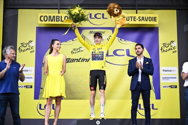 Danish Jonas Vingegaard of Jumbo-Visma celebrates on the podium in the yellow jersey of leader in the overall ranking after stage 16 of the Tour de France cycling race, an individual time trial from Passy to Combloux (22,4 km), France, Tuesday 18 July 2023. This year s Tour de France takes place from 01 to 23 July 2023. JASPERxJACOBS  x70768678x
