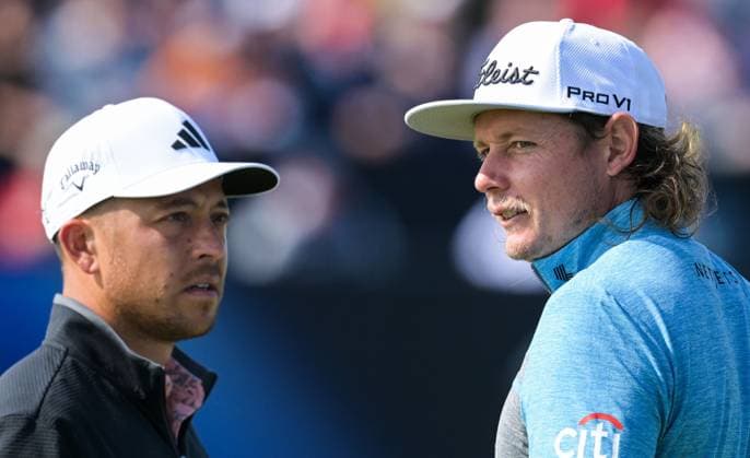 Mandatory Credit: Photo by Greig Cowie Shutterstock (14015622r) Cameron Smith on the 1st Green in deep conversation with Xander Schauffele The British Open Championship, Day One, Golf, Royal Liverpool Golf Club, Liverpool, UK - 20 Jul 2023 The British Open Championship, Day One, Golf, Royal Liverpool Golf Club, Liverpool, UK - 20 Jul 2023 Copyright: xGreigxCowie Shutterstockx 14015622r