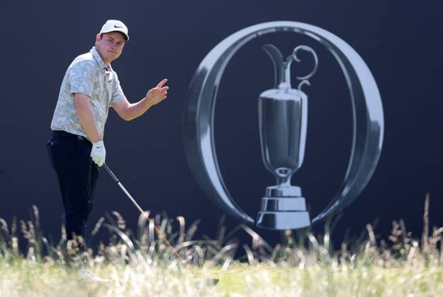 20th July 2023; Royal Liverpool Golf Club, Hoylake, Merseyside, England: The Open Championship Round 1; Robert MacIntyre (SCO) acknowledges the applause of the gallery at the 1st hole  ActionPlus12532844 DavidxBlunsden