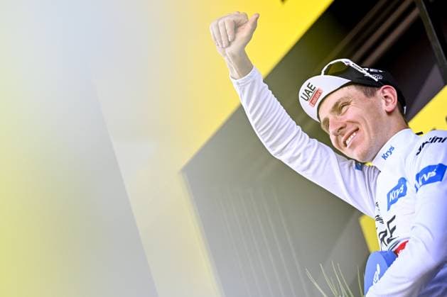 Slovenian Tadej Pogacar of UAE Team Emirates celebrates on the podium in the white jersey for best young rider after stage 18 of the Tour de France cycling race from MoÃ»tiers to Bourg-en-Bresse (184,9 km), France, Thursday 20 July 2023. This year s Tour de France takes place from 01 to 23 July 2023. JASPERxJACOBS  x70859176x