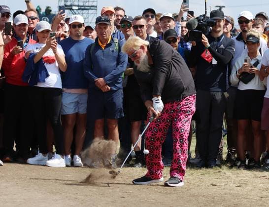 American John Daly hits out of the rough on the 1st fairway on the first day at the 151st Open Championship at Royal Liverpool Golf Club in Hoylake, England on Thursday, July 20, 2023.  LON2023072053 HUGOxPHILPOTT