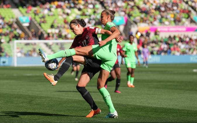 July 21, 2023, Melbourne, MB, Australia: Canada s Christine Sinclair competes for the ball with Nigeria s Ashleigh Plumptre during first half Group B soccer action at the FIFA Women s World Cup in Melbourne, Australia, Friday, July 21, 2023. Canada News - July 21, 2023  - ZUMAc35_ 20230721_zaf_c35_010 Copyright: xScottxBarbourx
