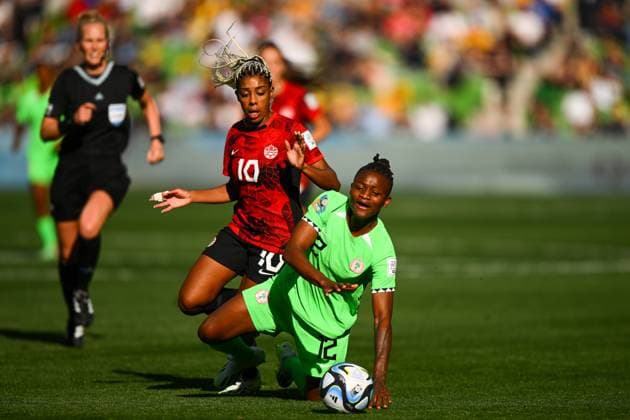 WWC23 CANADA NIGERIA, Uchenna Kanu of Nigeria (right) is fouled by Ashley Lawrence of Canada during the FIFA Women s World Cup 2023 soccer match between Nigeria and Canada at Melbourne Rectangular Stadium in Melbourne, Friday, July 21, 2023. ( NO ARCHIVING, EDITORIAL USE ONLY, NO USE IN BOOKS WITHOUT CONSENT MELBOURNE VICTORIA AUSTRALIA  Copyright: xMORGANxHANCOCKx 20230721001822537673 