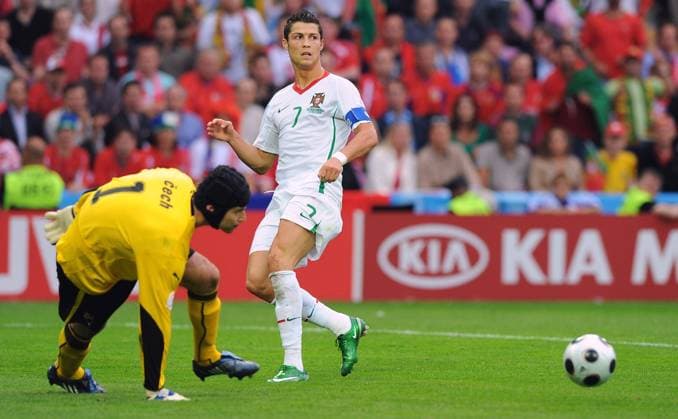 Euro 2008, Group A, Portugal vs Czech Republic Portugal s captain Cristiano Ronaldo crosses the ball for teammate Ricardo Quaresma to score the goal during the Euro 2008 UEFA Championships soccer match, Group A, Portugal vs Czech Republic at Stade de Geneve in Geneva, Switzerland on June 11, 2008. Portugal won 3-1. Photo by Steeve McMay Cameleon ABACAPRESS.COM Geneva Switzerland  Copyright: xMcMayxSteve ABACAx 155077_32 McMayxSteve ABACAx 155077_32