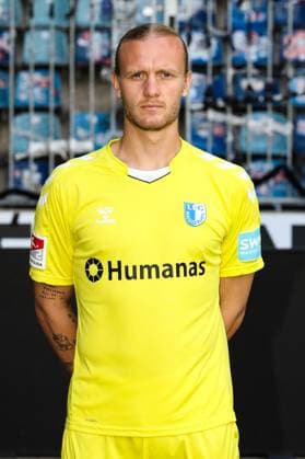 Goalkeeper Dominik Reimann 1 FC Magdeburg,1 2 Football Bundesliga portrait appointment 2023 2024 official photo appointment 1 FC Magdeburg in the MDCC Arena in Magdeburg portrait, portrait,single image,Germany, football, men,GER,20 07 2023 Christian Schroedter