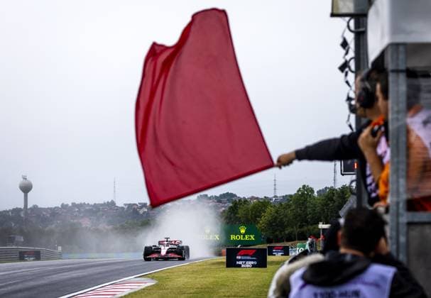 BUDAPEST - Kevin Magnussen (Haas F1 Team) drives past a red flag during 1st free practice at the Hungaroring Circuit ahead of the Hungarian Grand Prix. ANP REMKO DE WAAL xVIxANPxSportx xxANPxIVx 474008242 originalFilename: 474008242.jpg