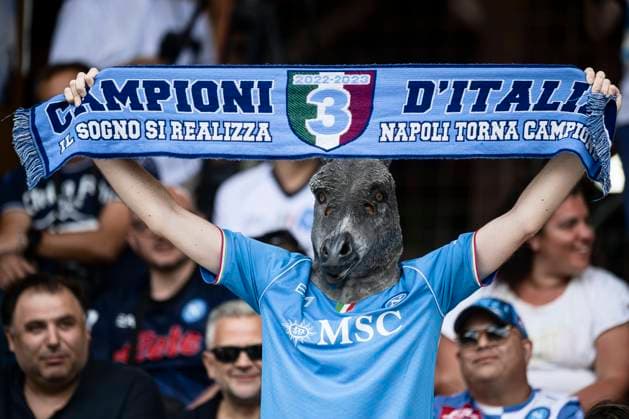 SSC Napoli v ASD Anaune Val di Non - Friendly A fan of SSC Napoli wearing a donkey mask holds a scarf prior to the pre-season friendly football match between SSC Napoli and ASD Anaune Val di Non. SSC Napoli won 6-1 over ASD Anaune Val di Non. Dimaro Italy Copyright: xNicolòxCampox