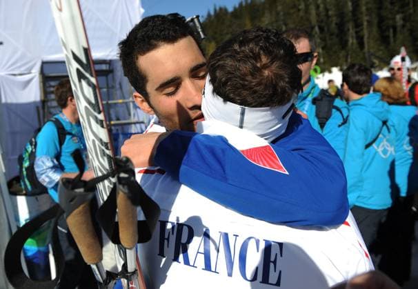 Olympic Winter games, Winterspiele,Spiele, Summer games - Biathlon Men s 15 km Mass Start - Whistler France s Martin Fourcade second place celebrates with compatriot Vincent Defrasne after the Biathlon Men s 15 km Mass Start for the Vancouver 2010 XXI Olympic Winter Games at Olympic Park in Whistler, Canada on February 21, 2010. Photo by Gouhier-Hahn-Nebinger ABACAPRESS.COM Whistler BC Canada  Copyright: xGouhier-Hahn-Nebinger ABACAx 220855_013 Gouhier-Hahn-Nebinger ABACAx 220855_013