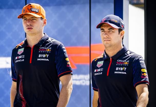 BUDAPEST - Max Verstappen (Red Bull Racing) together with teammate Sergio Perez prior to the 3rd free practice session at the Hungaroring Circuit ahead of the Hungarian Grand Prix. ANP REMKO DE WAAL F1 Grand Prix of Great Britain - Practice 2023 xVIxANPxSportx xxANPxIVx 474056569 originalFilename: 474056569.jpg