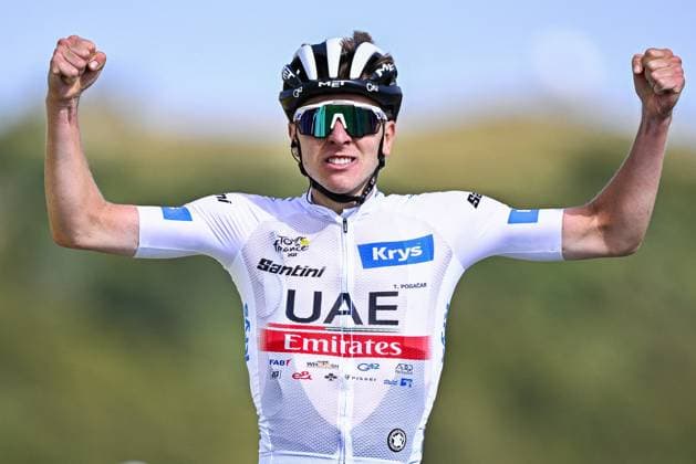 Slovenian Tadej Pogacar of UAE Team Emirates celebrates as he crosses the finish line to win stage 20 of the Tour de France cycling race from Belfort to Le Markstein Fellering (133,5 km), France, Saturday 22 July 2023. This year s Tour de France takes place from 01 to 23 July 2023. JASPERxJACOBS  x70951253x