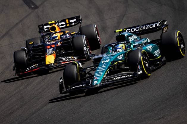 BUDAPEST - Sergio Perez (Red Bull Racing) and Fernando Alonso (Aston Martin) during the Hungarian Grand Prix at the Hungaroring. ANP REMKO DE WAAL F1 Grand Prix of Hungary 2023 xVIxANPxSportx xxANPxIVx 474122131 originalFilename: 474122131.jpg