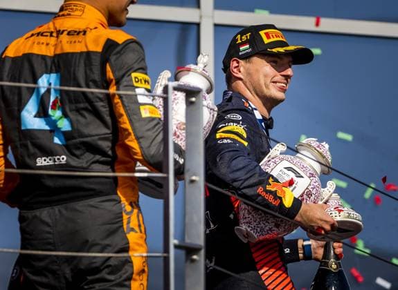 BUDAPEST - Max Verstappen (Red Bull Racing) on the podium with his broken trophy after winning the Hungarian Grand Prix at the Hungaroring. ANP REMKO DE WAAL F1 Grand Prix of Hungary 2023 xVIxANPxSportx xxANPxIVx 474125230 originalFilename: 474125230.jpg