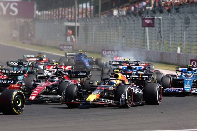 Start, 11 Sergio Perez MEX, Oracle Red Bull Racing , 77 Valtteri Bottas FIN, Alfa Romeo F1 Team Stake , F1 Grand Prix of Hungary at Hungaroring on July 23, 2023 in Budapest, Hungary Photo by HOCH ZWEI Budapest Hungary