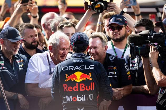 The Red Bull senior management Adrien Newey GB, Oracle Red Bull Racing, Head of Red Bull Technology , Helmut Marko, Aut, Oracle Red Bull Racing, Head of Motorsport , Christian Horner, GB, Oracle Red Bull Racing, Team Principal, from left is happy with third-placed Sergio Checo Perez MEX, Oracle Red Bull Racing 11 from behind HUN, Formula 1, Hungaroring, Hungary, 23 07 23 HUN, Formula 1, Hungaroring, Hungary, 23 07 23 Budapest Copyright: xFoto:xEIBNER ThomasxFuesslerx EP_tfr