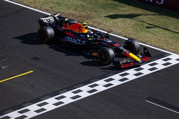 11 PEREZ Sergio (mex), Red Bull Racing RB19, action during the 2023 Formula 1 Qatar Airways Hungarian Grand Prix, 11th round of the 2023 Formula One World Championship, WM, Weltmeisterschaft from July 21 to 23, 2023 on the Hungaroring, in Mogyorod, Hungary - F1 - HUNGARIAN GRAND PRIX 2023 - RACE DPPI Panoramic  00123027_GOOD0353 