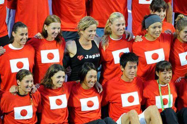 Japan Relief - Sony Ericsson Open - Day 4 Members of the ATP, Tennis Herren and WTA, Tennis Damen who are participating in the Sony Ericsson Open pose for a group photo, including (bottom row L-R from 3rd from L Kimiko Date-Krumm, Kei Nishikori, (both from Japan) and Kim Clijsters (C) of Belgium, as part of Tennis Family for Japan Relief during the Sony Ericsson Open at Crandon Park Tennis Center in Key Biscayne, FL, USA on March 25, 2011. Photo by Corinne Dubreuil ABACAPRESS.COM Key Biscayne FL United States  Copyright: xDubreuilxCorinne ABACAx 268682_002 DubreuilxCorinne ABACAx 268682_002