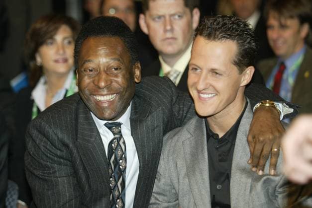 Pele (Files) Former Brazilian soccer legend Pele and German Formula one world champion Michael Schumacher joke in Frankfurt, Germany on December 5, 2003 at the start of the soccer World Cup 2003 preliminary draw ceremony. Photo by Henri Szwarc ABACAPRESS.COM Frankfurt Germany  Copyright: xSzwarcxHenri ABACAx 477744_013 SzwarcxHenri ABACAx 477744_013