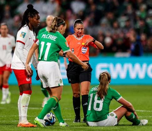 2023 FIFA Women s World Cup Group B, Perth Rectangular Stadium, Perth, Australia 26 7 2023 Canada vs Republic of Ireland WNT Ireland™s Katie McCabe checks on Kyra Carusa as Canada™s Kadeisha Buchanan receives a yellow card from referee Laura Fortunato Katie McCabe checks on Kyra Carusa as Kadeisha Buchanan receives a yellow card from Laura Fortunato 26 7 2023  Copyright: x INPHO RyanxByrnex RB1_7058