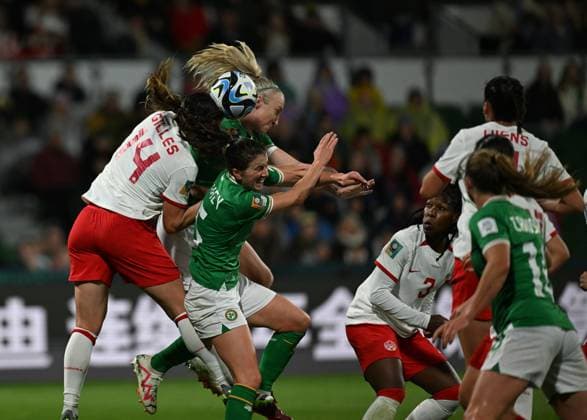 (230726) -- PERTH, July 26, 2023 -- Vanessa Gilles (1st L) of Canada vies with Niamh Fahey (2nd L) and Louise Quinn (3rd L) of Ireland during the group B match between Canada and Ireland at the 2023 FIFA Women s World Cup in Perth, Australia, July 26, 2023. ) (SP)AUSTRALIA-PERTH-FIFA-2023 WOMEN S WORLD CUP-GROUP B-CAN VS IRE MaoxSiqian 