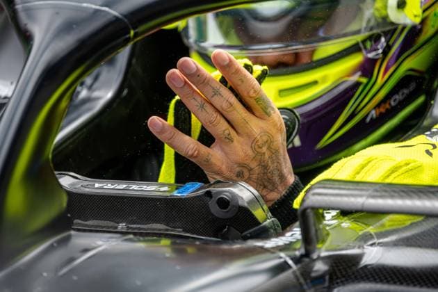 Mercedes-AMG Petronas UK rider Lewis Hamilton s tattood hands are seen ahead of the shootout ahead of the sprint race of the F1 Grand Prix of Belgium auto race, in Spa-Francorchamps, Saturday 29 July 2023. The Spa-Francorchamps Formula One Grand Prix takes place this weekend, from July 28th to July 30th. JONASxROOSENS  x71266861x
