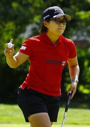 Golf: Evian Championship Nasa Hataoka of Japan acknowledges the crowd after making a birdie on the first hole during the final round of the Evian Championship golf tournament at Evian Resort Golf Club in Evian-les-Bains, France, on July 30, 2023.  A14AA0001726426P  