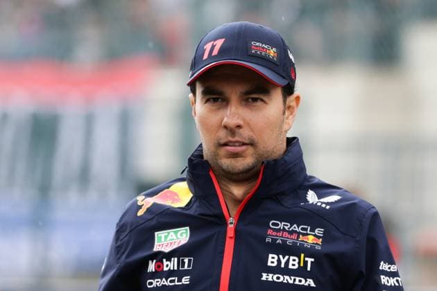 (230730) -- STAVELOT, July 30, 2023 -- Red Bull Racing s Mexican driver Sergio Perez reacts during a parade before the Race of the Formula 1 Belgian Grand Prix 2023 at the Circuit of Spa-Francorchamps, Stavelot, Belgium, July 30, 2023. ) (SP)BELGIUM-STAVELOT-FORMULA 1-GRAND PRIX-PARADE ZhengxHuansong 