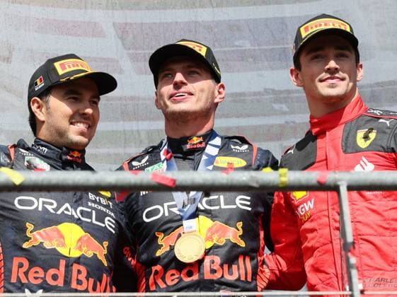 L-R, second Red Bull Racing Mexican rider Sergio Perez, Red Bull Racing Dutch rider Max Verstappen and third placed Scuderia Ferrari Monegasque rider Charles Leclerc celebrate on the podium after the F1 Grand Prix of Belgium auto race, in Spa-Francorchamps, Sunday 30 July 2023. The Spa-Francorchamps Formula One Grand Prix takes place this weekend, from July 28th to July 30th. BENOITxDOPPAGNE  x71312088x
