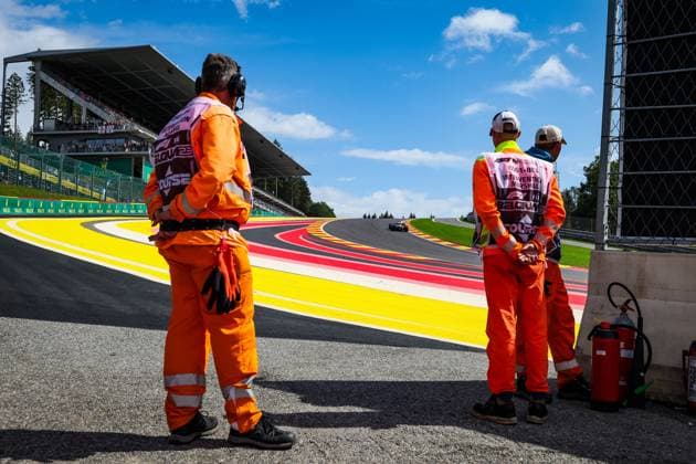 Marshalls watching the cars during the 2023 Formula 1 MSC Cruises Belgian Grand Prix, 12th round of the 2023 Formula One World Championship, WM, Weltmeisterschaft from July 28 to 30, 2023 on the Circuit de Spa-Francorchamps, in Stavelot, Belgium - F1 - BELGIAN GRAND PRIX 2023 - RACE DPPI Panoramic  00123028_G0OD8119 