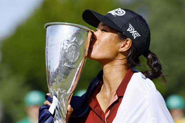 Golf: Evian Championship Celine Boutier of France kisses the victor s trophy after winning the Evian Championship golf tournament at Evian Resort Golf Club in Evian-les-Bains, France, on July 30, 2023.  A14AA0001727993P  