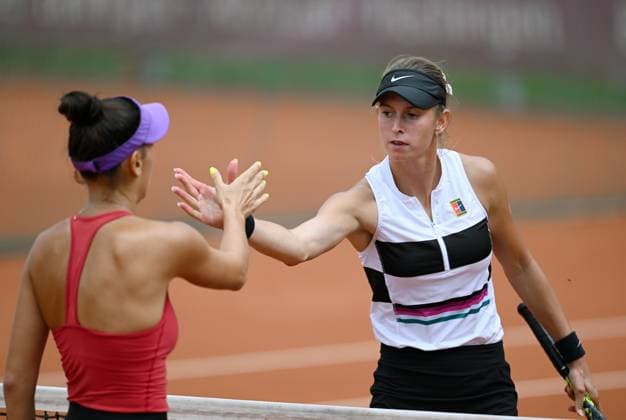 Tennis ITF Tour Ladies Open Hechingen 2023 02 08 2023 Alexandra Vecic re, GER high-fives Cristina Dinu ROU after the match