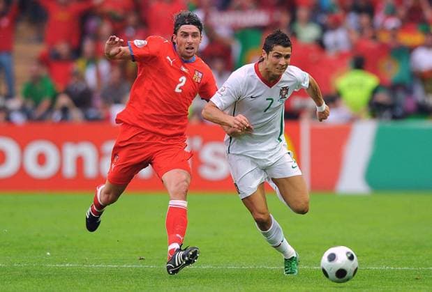 Euro 2008, Group A, Portugal vs Czech Republic Portugal s Cristiano Ronaldo and Czech Republic Zdenek Grygera battle for the ball during the Euro 2008 UEFA Championships soccer match, Group A, Portugal vs Czech Republic at Stade de Geneve in Geneva, Switzerland on June 11, 2008. Portugal won 3-1. Photo by Steeve McMay Cameleon ABACAPRESS.COM Geneva Switzerland  Copyright: xMcMayxSteve ABACAx 155077_24 McMayxSteve ABACAx 155077_24