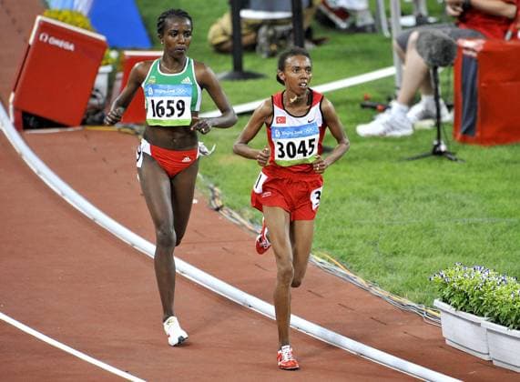 Beijing 2008 Olympic Games, Olympische Spiele, Olympia, OS - Athletics Turkey s Elvan Abeylegesse (R) and Ethiopia s Tirunesh Dibaba (L) compete in the women s 10000m Women Final of the XXiX Olympic Games at the National stadium in Beijing, China on August 15, 2008. Dibaba won the gold medal, Turkey s Elvan Abeylegesse won the silver and United States Shalane Flanagan bronze medal. Photo by Willis Parker Cameleon ABACAPRESS.COM Beijing  Copyright: xParkerxWillis ABACAx 160668_040 ParkerxWillis ABACAx 160668_040