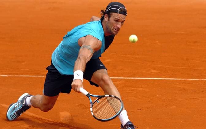 French Open fourth round at Roland Garros arena - Paris Spain s Carlos Moya defeats Sweden s Jonas Bjorkman 7-6, 6-2, 7-5 in their fourth round match of the Tennis French Open at Roland Garros arena, in Paris, France on June 4, 2007. Photo by Gouhier-Gorassini-Guignebourg Cameleon ABACAPRESS.COM Paris France  Copyright: xGorassini-Gouhier-Guignebourg ABACAx 123977_24 Gorassini-Gouhier-Guignebourg ABACAx 123977_24