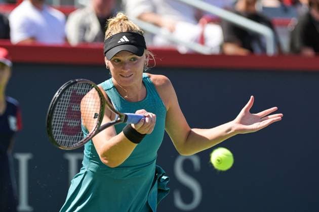 MONTREAL, QC - AUGUST 06: Ashlyn Krueger (USA) returns the ball during a qualifying round match at WTA, Tennis Damen National Bank Open on August 06, 2023 at IGA Stadium in Montreal, QC (Photo by David Kirouac Icon Sportswire) TENNIS: AUG 06 National Bank Open EDITORIAL USE ONLY Icon230806003
