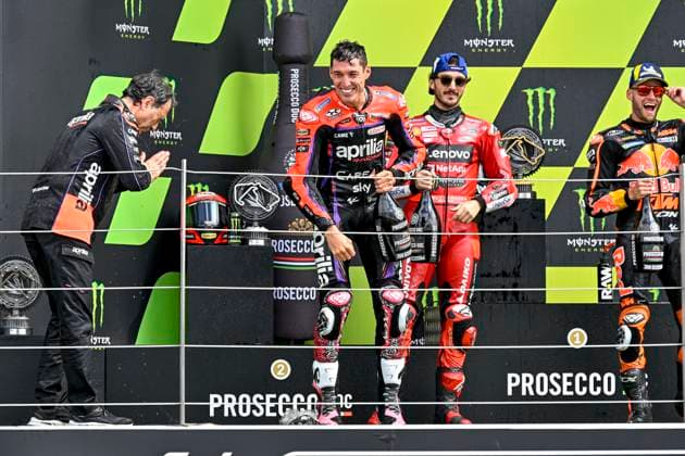 Bilder des Jahres 2023, Sport 08 August Sport Themen der Woche KW31 Sport Bilder des Tages BAGNAIA Francesco (ita), Ducati Lenovo Team, Ducati Desmosedici GP23, BINDER Brad (zaf), Red Bull KTM Factory Racing, KTM RC16, ESPARGARO Aleix (spa), Aprilia Racing Team Gresini, Aprilia RS-GP, portrait celebrates his win on the podium during the 2023 MotoGP Monster Energy British Grand Prix on the Silverstone Circuit from August 4 to 6, in Silverstone, United Kingdom - MOTO - MOTO GP - BRITISH GRAND PRIX 2023 DPPI Panoramic  0952_R2_41_GP9_2023 