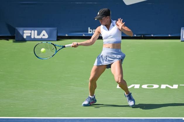 MONTREAL, QC - AUGUST 06: Yulia Putintseva (KAZ) returns the ball during a qualifying round match at WTA, Tennis Damen National Bank Open on August 06, 2023 at IGA Stadium in Montreal, QC (Photo by David Kirouac Icon Sportswire) TENNIS: AUG 06 National Bank Open EDITORIAL USE ONLY Icon230806101