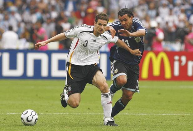 World Cup 2006-Quarter final, Germany vs Argentina Argentina s Carlos Tevez and Germany s Arne Friedrich battle for the ball during the FIFA World Cup, WM, Weltmeisterschaft, Fussball 2006, quarter final, Germany vs Argentina, in Berlin, Germany, on June 30, 2006. The game ended in draw 1-1 and Germany won (4-2) in a penalty-kick shootout. Photo by Christian Liewig ABACAPRESS.COM Berlin Germany  Copyright: xLiewigxChristian ABACAx 101125_14 LiewigxChristian ABACAx 101125_14