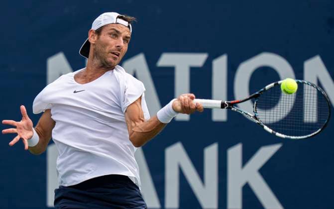 (230807) -- TORONTO, Aug. 7, 2023 -- Matija Pecotic of Croatia returns the ball against Matteo Arnaldi of Italy during the second round of men s qualifying singles match at the 2023 National Bank Open in Toronto, Canada, on Aug. 6, 2023. (Photo by Xinhua) (SP)CANADA-TORONTO-TENNIS-NATIONAL BANK OPEN-MEN S SINGLES-QUALIFICATIONS ZouxZheng 