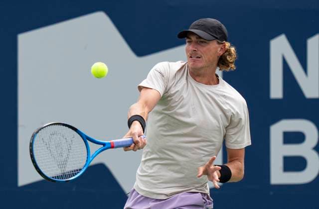 (230807) -- TORONTO, Aug. 7, 2023 -- Max Purcell of Australia returns the ball against Brayden Schnur of Canada during the second round of men s qualifying singles match at the 2023 National Bank Open in Toronto, Canada, on Aug. 6, 2023. (Photo by Xinhua) (SP)CANADA-TORONTO-TENNIS-NATIONAL BANK OPEN-MEN S SINGLES-QUALIFICATIONS ZouxZheng 