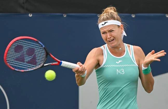 August 7, 2023, Montreal, PQ, Canada: Marie Bouzkova from the Czech Republic plays a shot to Kayla Day from the United States during their first round match at the National Bank Open tennis tournament in Montreal, Monday, August 7, 2023. Canada News - August 7, 2023  - ZUMAc35_ 20230807_zaf_c35_007 Copyright: xGrahamxHughesx