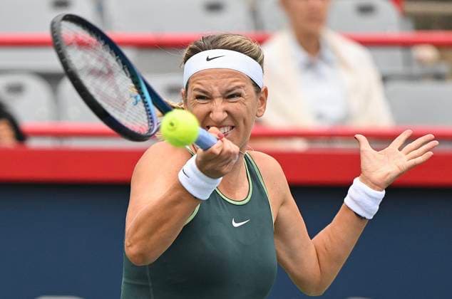 August 7, 2023, Montreal, PQ, Canada: Victoria Azarenka from Belarus plays a shot to Magda Linette from Poland during their first round match at the National Bank Open tennis tournament in Montreal, Monday, August 7, 2023. Canada News - August 7, 2023  - ZUMAc35_ 20230807_zaf_c35_013 Copyright: xGrahamxHughesx