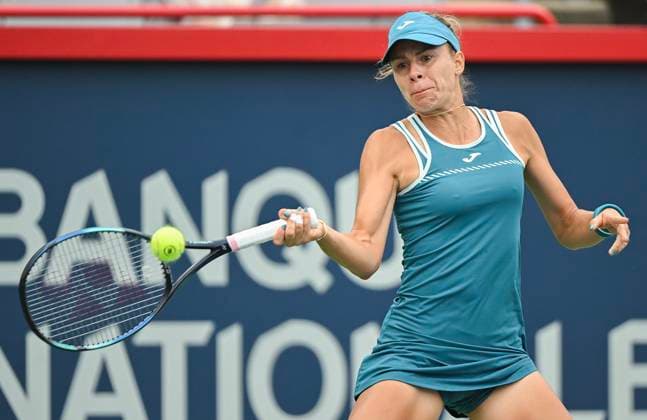 August 7, 2023, Montreal, PQ, Canada: Magda Linette from Poland plays a shot to Victoria Azarenka from Belarus during their first round match at the National Bank Open tennis tournament in Montreal, Monday, August 7, 2023. Canada News - August 7, 2023  - ZUMAc35_ 20230807_zaf_c35_014 Copyright: xGrahamxHughesx