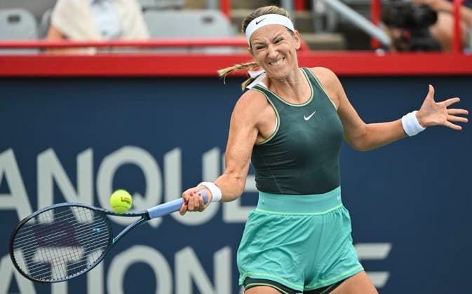 August 7, 2023, Montreal, PQ, Canada: Victoria Azarenka from Belarus plays a shot to Magda Linette from Poland during their first round match at the National Bank Open tennis tournament in Montreal, Monday, August 7, 2023. Canada News - August 7, 2023  - ZUMAc35_ 20230807_zaf_c35_016 Copyright: xGrahamxHughesx