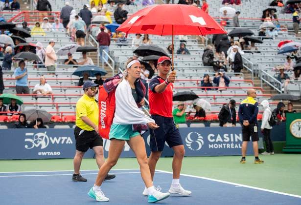 August 7, 2023, Montreal, PQ, Canada: Victoria Azarenka from Belarus walks off court during a rain delay during her first round match against Magda Linette from Poland at the National Bank Open tennis tournament in Montreal, Monday, August 7, 2023. Canada News - August 7, 2023  - ZUMAc35_ 20230807_zaf_c35_017 Copyright: xGrahamxHughesx