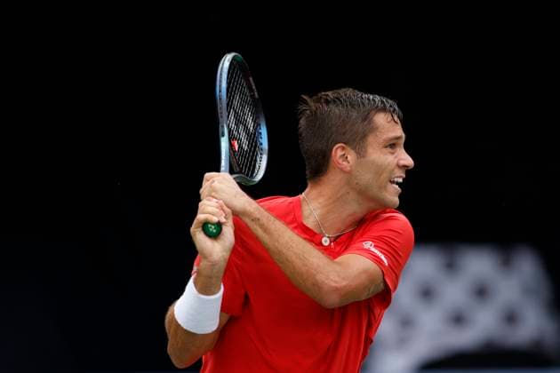August 7, 2023, TORONTO, ON, Canada: Alexis Galarneau of Canada returns a ball to Francisco Cerundolo of Argentina during Day One of the National Bank Open in Toronto, Monday, Aug. 7, 2023. Canada News - August 7, 2023  - ZUMAc35_ 20230807_zaf_c35_024 Copyright: xColexBurstonx
