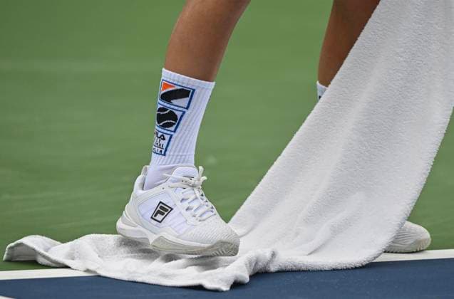 August 7, 2023, Montreal, PQ, Canada: A ballboy dries the baseline during a tennis match at the National Bank Open tennis tournament in Montreal, Monday, August 7, 2023. Canada News - August 7, 2023  - ZUMAc35_ 20230807_zaf_c35_040 Copyright: xGrahamxHughesx
