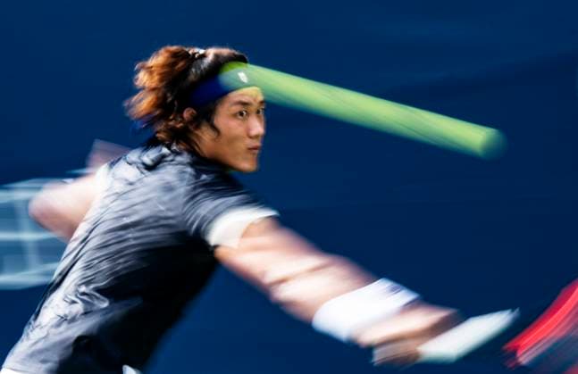 (230808) -- TORONTO, Aug. 8, 2023 -- Zhang Zhizhen of China returns the ball during the first round of men s singles match between Zhang Zhizhen of China and Thanasi Kokkinakis of Australia at the 2023 National Bank Open in Toronto, Canada, on Aug. 7, 2023. (Photo by Xinhua) (SP)CANADA-TORONTO-TENNIS-NATIONAL BANK OPEN-MEN S SINGLES ZouxZheng 