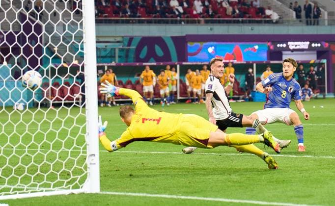 Ritsu Doan, JPN 8 scores, shoots goal , Tor, Treffer, Torschuss, 1-1 against Manuel NEUER, DFB 1 goalkeeper, David Raum, DFB 3 in the group E match GERMANY - JAPAN 1-2 FIFA World Cup, WM, Weltmeisterschaft, Fussball 2022 QATAR Season 2022 2023, Nov 22, 2022 in Khalifa International Stadium in Doha, Qatar.