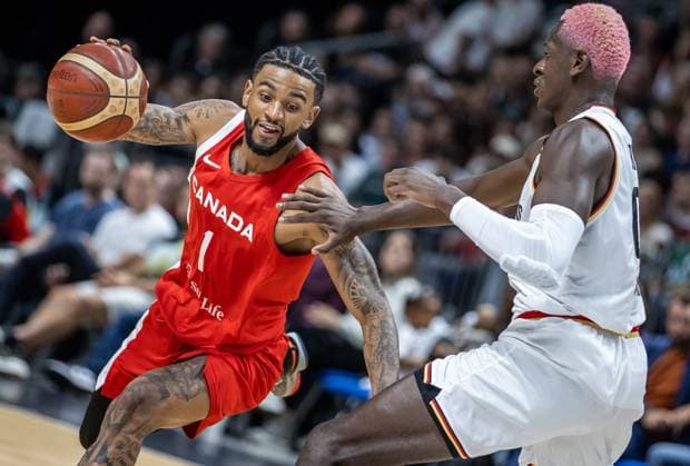 Basketball Laender games, Germany Canada, Mercedes Benz Arena Nickeil Alexander Walker from Canada fights against Germanys Isaac Bonga r for the ball Basketball Laender game Germany Canada